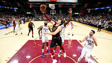 CLEVELAND, OHIO - FEBRUARY 26: Cedi Osman #16 of the Cleveland Cavaliers shoots over Shake Milton #18 of the Philadelphia 76ers during the second half at Rocket Mortgage Fieldhouse on February 26, 2020 in Cleveland, Ohio. The Cavaliers defeated the 76ers 108-94. NOTE TO USER: User expressly acknowledges and agrees that, by downloading and/or using this photograph, user is consenting to the terms and conditions of the Getty Images License Agreement. (Photo by Jason Miller/Getty Images)