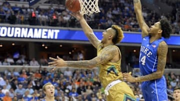 Mar 10, 2016; Washington, DC, USA; Notre Dame Fighting Irish forward Zach Auguste (30) shoots as Duke Blue Devils guard Brandon Ingram (14) defends in the first half during day three of the ACC conference tournament at Verizon Center. Mandatory Credit: Tommy Gilligan-USA TODAY Sports