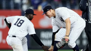 NEW YORK, NY - MAY 22: Didi Gregorius #18 and Aaron Judge #99 of the New York Yankees celebrate the 4-2 win over the Kansas City Royals on May 22, 2017 at Yankee Stadium in the Bronx borough of New York City. (Photo by Elsa/Getty Images)