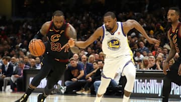 CLEVELAND, OH - JUNE 08: LeBron James #23 of the Cleveland Cavaliers handles the ball against Kevin Durant #35 of the Golden State Warriors in the second half during Game Four of the 2018 NBA Finals at Quicken Loans Arena on June 8, 2018 in Cleveland, Ohio. NOTE TO USER: User expressly acknowledges and agrees that, by downloading and or using this photograph, User is consenting to the terms and conditions of the Getty Images License Agreement. (Photo by Gregory Shamus/Getty Images)