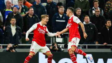 LONDON, ENGLAND - JANUARY 15: Martin Odegaard of Arsenal celebrates scoring his side's second goal with team mate Granit Xhaka during the Premier League match between Tottenham Hotspur and Arsenal FC at Tottenham Hotspur Stadium on January 15, 2023 in London, United Kingdom. (Photo by Craig Mercer/MB Media/Getty Images)