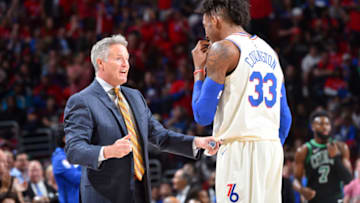 PHILADELPHIA, PA - MAY 7: Head Coach Brett Brown and Robert Covington #33 of the Philadelphia 76ers talk during the game against the Boston Celtics during Game Four of the Eastern Conference Semifinals of the 2018 NBA Playoffs on May 5, 2018 at Wells Fargo Center in Philadelphia, Pennsylvania. NOTE TO USER: User expressly acknowledges and agrees that, by downloading and or using this photograph, User is consenting to the terms and conditions of the Getty Images License Agreement. Mandatory Copyright Notice: Copyright 2018 NBAE (Photo by Jesse D. Garrabrant/NBAE via Getty Images)