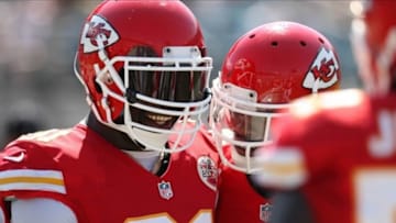 Sep 8, 2013; Jacksonville, FL, USA; Kansas City Chiefs outside linebacker Tamba Hali (91) reacts after running an interception back for a touchdown during the game against the Jacksonville Jaguars at EverBank Field. Mandatory Credit: Rob Foldy-USA TODAY Sports