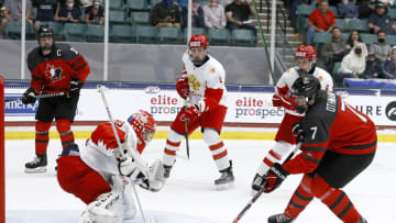 New York Rangers draft pick Brennan Othmann #7 puts a shot on goal against Russia in the first period during the 2021 IIHF Ice Hockey U18 World Championship Gold Medal Game (Photo by Tom Pennington/Getty Images)