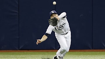 Jul 1, 2016; St. Petersburg, FL, USA;Tampa Bay Rays left fielder Brandon Guyer (5) catches a fly ball during the first inning against the Detroit Tigers at Tropicana Field. Mandatory Credit: Kim Klement-USA TODAY Sports