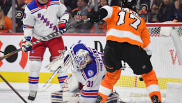 Jan 15, 2022; Philadelphia, Pennsylvania, USA; New York Rangers goaltender Igor Shesterkin (31) covers the puck against the Philadelphia Flyers during the second period at Wells Fargo Center. Mandatory Credit: Eric Hartline-USA TODAY Sports
