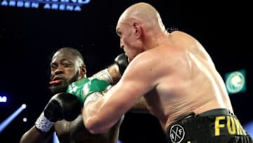 LAS VEGAS, NEVADA - FEBRUARY 22: Tyson Fury (R) punches Deontay Wilder during their Heavyweight bout for Wilder's WBC and Fury's lineal heavyweight title on February 22, 2020 at MGM Grand Garden Arena in Las Vegas, Nevada. (Photo by Al Bello/Getty Images)