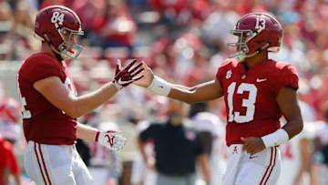 TUSCALOOSA, AL - SEPTEMBER 29: Tua Tagovailoa #13 of the Alabama Crimson Tide reacts with Hale Hentges #84 after passing for a touchown to Henry Ruggs III #11 against the Louisiana Ragin Cajuns at Bryant-Denny Stadium on September 29, 2018 in Tuscaloosa, Alabama. (Photo by Kevin C. Cox/Getty Images)