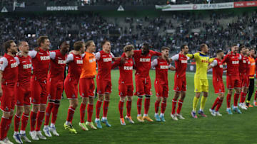FC Köln players celebrate their win over Borussia Mönchengladbach. (Photo by Martin Rose/Getty Images)