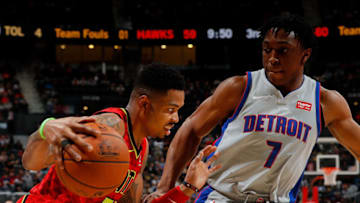 ATLANTA, GA - FEBRUARY 11: Kent Bazemore #24 of the Atlanta Hawks drives against Stanley Johnson #7 of the Detroit Pistons at Philips Arena on February 11, 2018 in Atlanta, Georgia. NOTE TO USER: User expressly acknowledges and agrees that, by downloading and or using this photograph, User is consenting to the terms and conditions of the Getty Images License Agreement. (Photo by Kevin C. Cox/Getty Images)
