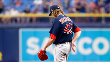 Jun 23, 2021; St. Petersburg, Florida, USA; Boston Red Sox starting pitcher Garrett Richards (43) looks down after giving up a home run during the second inning against the Tampa Bay Rays at Tropicana Field. Mandatory Credit: Kim Klement-USA TODAY Sports