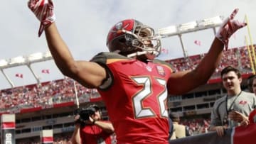 Dec 27, 2015; Tampa, FL, USA;Tampa Bay Buccaneers running back Doug Martin (22) runs out of the tunnel before the game against the Chicago Bears at Raymond James Stadium. Mandatory Credit: Kim Klement-USA TODAY Sports