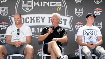 EL SEGUNDO, CA - SEPTEMBER 14: Robyn Regher #44 and Tyler Toffoli of the Los Angeles Kings, join Daryl Sutter, Head Coach of the Los Angeles Kings share their experiences with the Stanley Cup during the Los Angeles Kings Hockey Fest at Toyota Sports Center on September 14, 2014 in El Segundo, California. (Photo by Aaron Poole/NHLI via Getty Images)