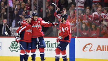 WASHINGTON, DC - JANUARY 14: Alex Ovechkin #8 of the Washington Capitals celebrates with Dmitry Orlov #9 and Tom Wilson #43 after scoring a goal against the St. Louis Blues in the first period at Capital One Arena on January 14, 2019 in Washington, DC. (Photo by Patrick McDermott/NHLI via Getty Images)