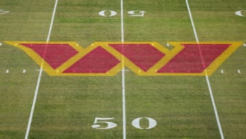 LANDOVER, MD - JANUARY 01: A general view of the Washington Commanders logo on the field before the game between the Washington Commanders and the Cleveland Browns at FedExField on January 1, 2023 in Landover, Maryland. (Photo by Scott Taetsch/Getty Images)
