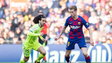 BARCELONA, SPAIN - FEBRUARY 15: (BILD ZEITUNG OUT) Marc Cucurella of Getafe CF and Frenkie de Jong of FC Barcelona battle for the ball during the Liga match between FC Barcelona and Getafe CF at Camp Nou on February 15, 2020 in Barcelona, Spain. (Photo by Alejandro/DeFodi Images via Getty Images)