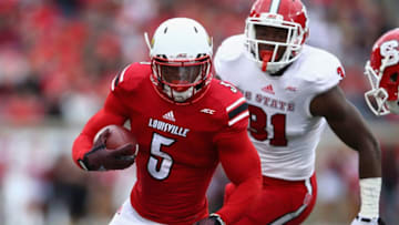LOUISVILLE, KY - OCTOBER 18: Michael Dyer #5 of the Louisville Cardinals runs with the ball during the game against the North Carolina State Wolfpack at Papa John's Cardinal Stadium on October 18, 2014 in Louisville, Kentucky. (Photo by Andy Lyons/Getty Images)