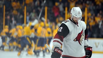Apr 7, 2016; Nashville, TN, USA; Arizona Coyotes center Brad Richardson (12) reacts after a 3-2 overtime loss against the Nashville Predators at Bridgestone Arena. Mandatory Credit: Christopher Hanewinckel-USA TODAY Sports