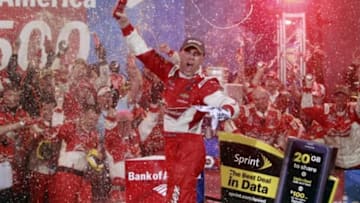 Oct 11, 2014; Concord, NC, USA; Sprint Cup Series driver Kevin Harvick (4) celebrates in victory lane after winning after winning the Bank of America 500 at Charlotte Motor Speedway. Mandatory Credit: Peter Casey-USA TODAY Sports