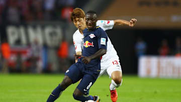 COLOGNE, GERMANY - SEPTEMBER 25: Naby Keïta of RB Leipzig battles for the ball with Yuya Osako of Koeln during the Bundesliga match between 1. FC Koeln and RB Leipzig at RheinEnergieStadion on September 25, 2016 in Cologne, Germany. (Photo by Dean Mouhtaropoulos/Bongarts/Getty Images)