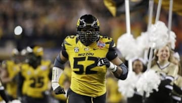 Jan 3, 2014; Arlington, TX, USA; Missouri Tigers defensive lineman Michael Sam (52) runs on the field before the game against the Oklahoma State Cowboys at the 2014 Cotton Bowl at AT&T Stadium. Missouri beat Oklahoma State 41-31. Mandatory Credit: Tim Heitman-USA TODAY Sports