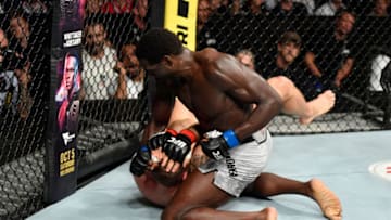 COPENHAGEN, DENMARK - SEPTEMBER 28: (R-L) Jared Cannonier punches Jack Hermansson of Sweden in their middleweight bout during the UFC Fight Night event at Royal Arena on September 28, 2019 in Copenhagen, Denmark. (Photo by Jeff Bottari/Zuffa LLC/Zuffa LLC via Getty Images)