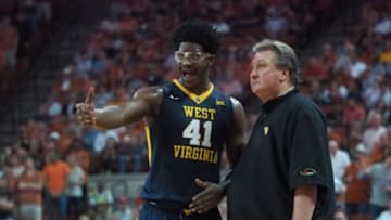 Feb 16, 2016; Austin, TX, USA; West Virginia Mountaineers forward Devin Williams (41) talks with head coach Bob Huggins against the Texas Longhorns during the second half at the Frank Erwin Special Events Center. Texas won 85-78. Mandatory Credit: Brendan Maloney-USA TODAY Sports