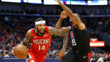 NEW ORLEANS, LOUISIANA - JANUARY 18: Brandon Ingram #14 of the New Orleans Pelicans drives against Rodney McGruder #19 of the LA Clippers during a game at the Smoothie King Center on January 18, 2020 in New Orleans, Louisiana. NOTE TO USER: User expressly acknowledges and agrees that, by downloading and or using this Photograph, user is consenting to the terms and conditions of the Getty Images License Agreement. (Photo by Jonathan Bachman/Getty Images)