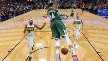 Giannis Antetokounmpo #34 of the Milwaukee Bucks dunks as Brandon Ingram #14 of the New Orleans Pelicans (Photo by Jonathan Bachman/Getty Images)