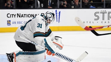 LAS VEGAS, NEVADA - APRIL 21: Martin Jones #31 of the San Jose Sharks blocks a Vegas Golden Knights' shot in the first overtime period of Game Six of the Western Conference First Round during the 2019 NHL Stanley Cup Playoffs at T-Mobile Arena on April 21, 2019 in Las Vegas, Nevada. The Sharks defeated the Golden Knights 2-1 in double overtime to even the series at 3-3. (Photo by Ethan Miller/Getty Images)
