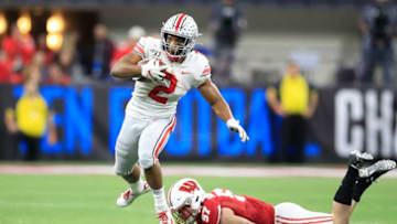 INDIANAPOLIS, INDIANA - DECEMBER 07: J.K. Dobbins #2 of the Ohio State Buckeyes runs with the ball in the BIG Ten Football Championship Game against the Wisconsin Badgers at Lucas Oil Stadium on December 07, 2019 in Indianapolis, Indiana. (Photo by Andy Lyons/Getty Images)