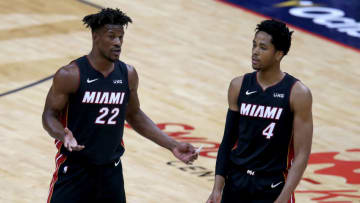 Jimmy Butler #22 of the Miami Heat and KZ Okpala #4 of the Miami Heat stand on the court during the first half of an NBA game against the New Orleans Pelicans (Photo by Sean Gardner/Getty Images)