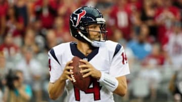 Aug 9, 2014; Glendale, AZ, USA; Houston Texans quarterback Ryan Fitzpatrick (14) throws during the first half against the Arizona Cardinals at University of Phoenix Stadium. Mandatory Credit: Matt Kartozian-USA TODAY Sports