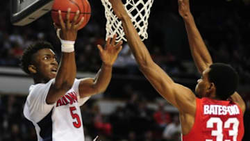 Mar 21, 2015; Portland, OR, USA; Arizona Wildcats forward Stanley Johnson (5) shoots the basketball against Ohio State Buckeyes forward Keita Bates-Diop (33) during the second half in the third round of the 2015 NCAA Tournament at Moda Center. The Wildcats defeated the Buckeyes 73-58. Mandatory Credit: Godofredo Vasquez-USA TODAY Sports