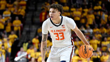 COLLEGE PARK, MARYLAND - DECEMBER 02: Coleman Hawkins #33 of the Illinois Fighting Illini handles the ball against the Maryland Terrapins at Xfinity Center on December 02, 2022 in College Park, Maryland. (Photo by G Fiume/Getty Images)