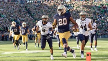 Oct 10, 2015; South Bend, IN, USA; Notre Dame Fighting Irish running back C.J. Prosise (20) runs for a touchdown in front of Navy Midshipmen safety Lorentez Barbour (2) and linebacker Michah Thomas (44) in the third quarter at Notre Dame Stadium. Mandatory Credit: Matt Cashore-USA TODAY Sports