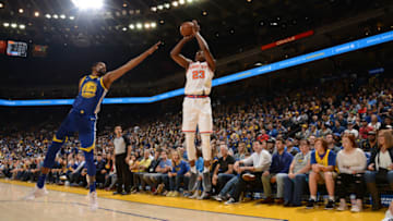 OAKLAND, CA - APRIL 1: Danuel House #23 of the Phoenix Suns shoots the ball against Kevin Durant #35 of the Golden State Warriors on April 1, 2018 at ORACLE Arena in Oakland, California. NOTE TO USER: User expressly acknowledges and agrees that, by downloading and or using this photograph, user is consenting to the terms and conditions of Getty Images License Agreement. Mandatory Copyright Notice: Copyright 2018 NBAE (Photo by Noah Graham/NBAE via Getty Images)