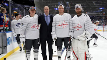 ST LOUIS, MISSOURI - JANUARY 25: (L-R) T.J. Oshie #77, head coach Todd Reirden, John Carlson #74 and Braden Holtby #70 of the Washington Capitals pose for a photo prior to the 2020 Honda NHL All-Star Game at Enterprise Center on January 25, 2020 in St Louis, Missouri. (Photo by Bruce Bennett/Getty Images)
