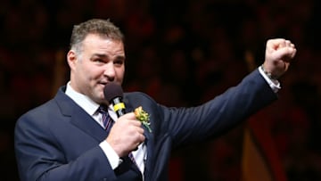 PHILADELPHIA, PA - NOVEMBER 20: Eric Lindros addresses the fans during a pregame ceremony inducting him and former teammate John LeClair into the Flyers Hall of Fame before the game between the Philadelphia Flyers and the Minnesota Wild on November 20, 2014 at the Wells Fargo Center in Philadelphia, Pennsylvania. (Photo by Elsa/Getty Images)