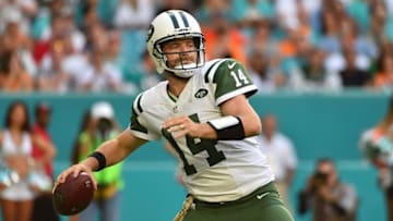 Nov 6, 2016; Miami Gardens, FL, USA; New York Jets quarterback Ryan Fitzpatrick (14) attempts a pass against the Miami Dolphins during the second half at Hard Rock Stadium. The Miami Dolphins defeat the New York Jets 27-23. Mandatory Credit: Jasen Vinlove-USA TODAY Sports