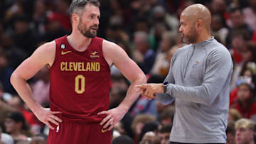 CHICAGO, ILLINOIS - DECEMBER 31: Kevin Love #0 of the Cleveland Cavaliers talks with head coach J. B. Bickerstaff against the Chicago Bulls during the second half at United Center on December 31, 2022 in Chicago, Illinois. NOTE TO USER: User expressly acknowledges and agrees that, by downloading and or using this photograph, User is consenting to the terms and conditions of the Getty Images License Agreement. (Photo by Michael Reaves/Getty Images)