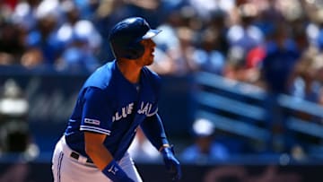 TORONTO, ON - JUNE 30: Justin Smoak #14 of the Toronto Blue Jays hits his second home run of the game in the fifth inning during a MLB game against the Kansas City Royals at Rogers Centre on June 30, 2019 in Toronto, Canada. (Photo by Vaughn Ridley/Getty Images)