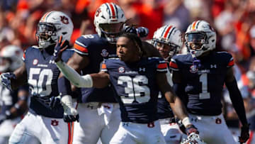 Auburn football defensive back Jaylin Simpson (36) celebrates his interception as Auburn Tigers take on Georgia Bulldogs at Jordan-Hare Stadium in Auburn, Ala., on Saturday, Sept. 30, 2023.