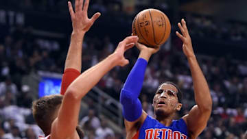 Oct 26, 2016; Toronto, Ontario, CAN; Detroit Pistons forward Tobias Harris (34)) takes a shot over Toronto Raptors center Jonas Valanciunas (17) in the first quarter at Air Canada Centre. Mandatory Credit: Dan Hamilton-USA TODAY Sports