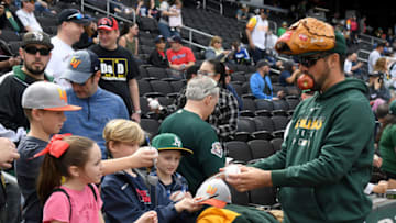 LAS VEGAS, NEVADA - FEBRUARY 29: Zach Lee #77 of the Oakland Athletics signs autographs for fans before an exhibition game against the the Cleveland Indians at Las Vegas Ballpark on February 29, 2020 in Las Vegas, Nevada. The Athletics defeated the Indians 8-6. (Photo by Ethan Miller/Getty Images)