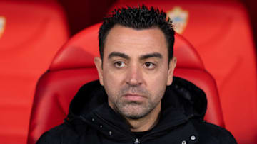 Xavi Hernandez looks on prior to the match between UD Almeria and FC Barcelona at Juegos Mediterraneos on February 26, 2023 in Almeria, Spain. (Photo by Aitor Alcalde Colomer/Getty Images)