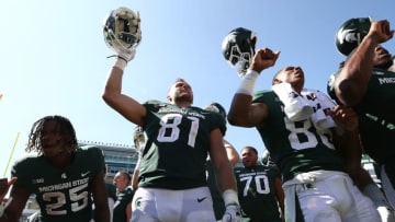 EAST LANSING, MI - SEPTEMBER 02: Matt Sokol #81 of the Michigan State Spartans sings the fight song after a 35-10 win over the Bowling Green Falcons at Spartan Stadium on September 2, 2017 in East Lansing, Michigan. (Photo by Gregory Shamus/Getty Images)