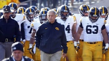 Oct 17, 2015; Evanston, IL, USA; Iowa Hawkeyes head coach Kirk Ferentz leads his team to the field before the game against the Northwestern Wildcat at Ryan Field. Mandatory Credit: Jerry Lai-USA TODAY Sports