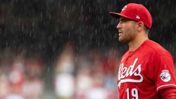 Cincinnati Reds first baseman Joey Votto (19) looks on in as it rains in the fifth inning of the MLB game between Cincinnati Reds and Colorado Rockies at Great American Ball Park on Sunday, June 13, 2021, in downtown Cincinnati.Cincinnati Reds Colorado Rockies