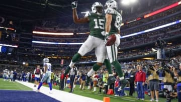 Dec 19, 2015; Arlington, TX, USA; New York Jets wide receiver Eric Decker (87) celebrates with wide receiver Brandon Marshall (15) after scoring a touchdown against the Dallas Cowboys during the second half at AT&T Stadium. Mandatory Credit: Kevin Jairaj-USA TODAY Sports
